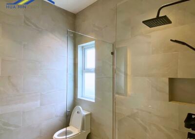 Modern bathroom with glass shower enclosure