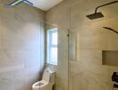 Modern bathroom with glass shower enclosure