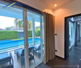 Living area with view of pool