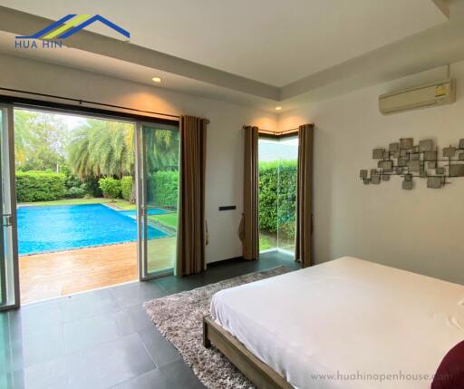 Bedroom with pool view