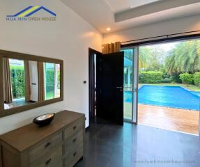 Bedroom with a view of the swimming pool