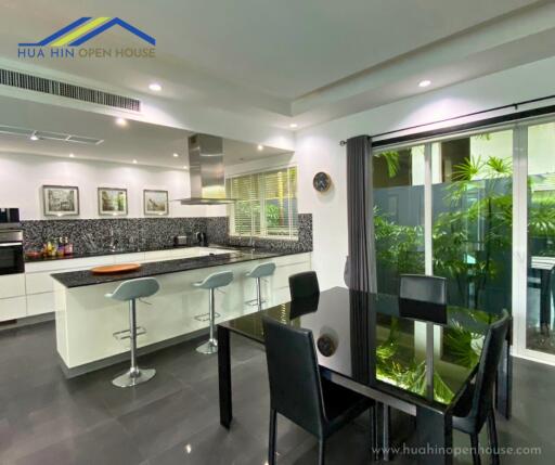 Modern kitchen with dining area