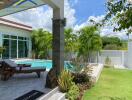 beautiful backyard with pool and greenery