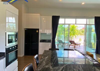 Modern kitchen with dining area