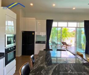 Modern kitchen with dining area