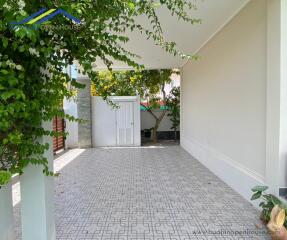 Covered outdoor area with tiled flooring