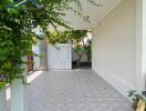 Covered outdoor area with tiled flooring