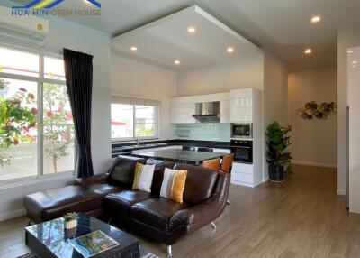 Modern open living room and kitchen space