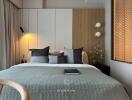 Modern bedroom with bed, pillows, and bedside lamps