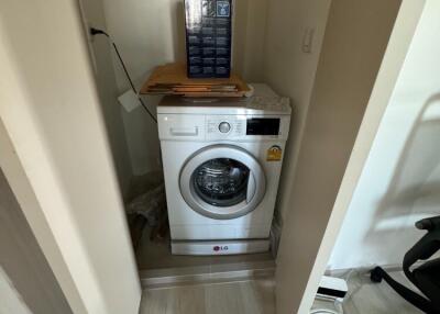 Small laundry area with washing machine