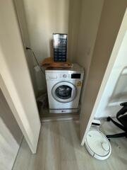 Small laundry area with washing machine