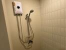 Shower area with electric water heater