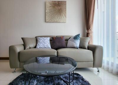 Modern living room with sofa and glass coffee table