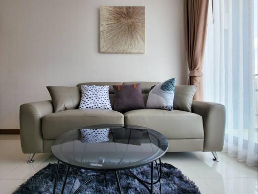 Modern living room with sofa and glass coffee table