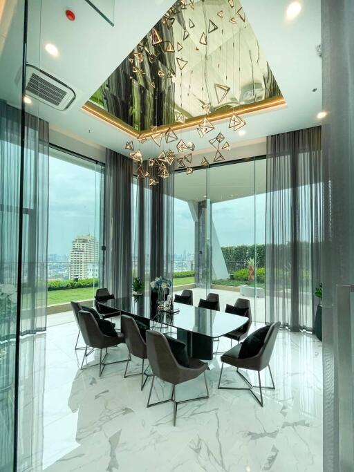 Modern dining room with large windows and city view