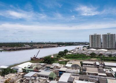 View of the river and surrounding buildings in the neighborhood