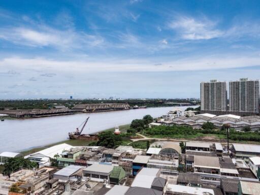 View of the river and surrounding buildings in the neighborhood