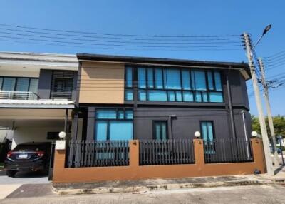 Two-story modern house with carport