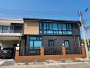 Two-story modern house with carport