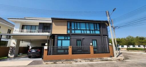 Two-story modern house with carport