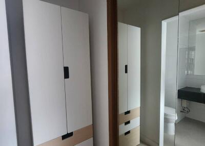 Bedroom with wardrobe and mirror