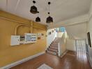 Staircase with electrical panel and decor