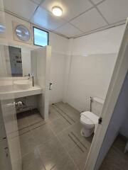 Modern bathroom with tiled floor and sink