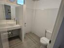 Modern bathroom with tiled floor and sink