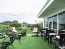 Outdoor patio with seating and scenic view