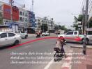 Urban street view with traffic and commercial buildings