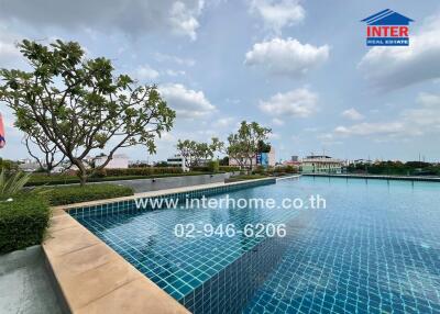 Outdoor swimming pool in a residential complex