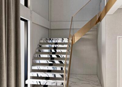 Elegant modern staircase with marble steps and metal railing