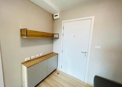 Modern hallway with wooden and white furniture