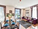 Modern living room with dining area and large windows