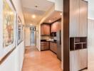 Modern kitchen with wooden cabinets and stainless steel appliances