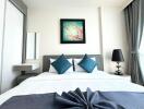 Modern bedroom with contemporary decor and vibrant artwork