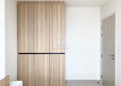 Bedroom with a wooden wardrobe