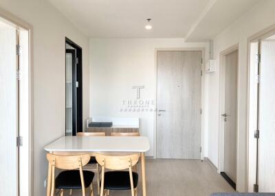 Modern dining area with a table and four chairs