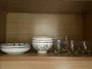 Kitchen shelf with dishes and glasses