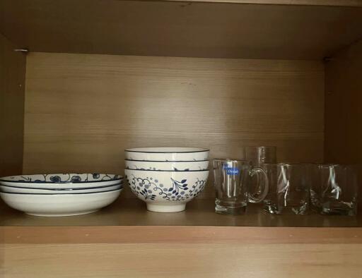 Kitchen shelf with dishes and glasses