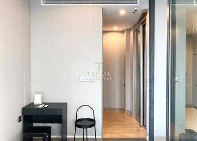 Modern hallway with a desk and chair