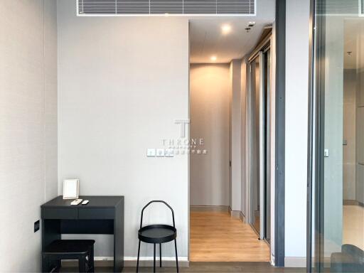 Modern hallway with a desk and chair