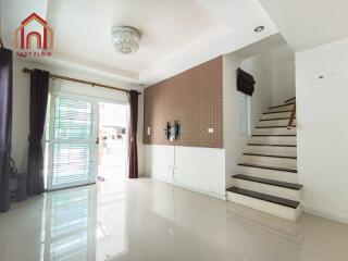 Modern living room with a staircase