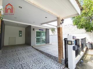 modern building entrance with patterned tile flooring