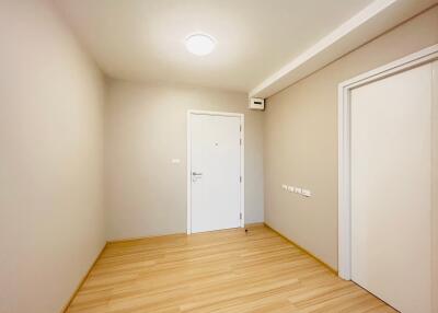 Bright entrance area with wooden flooring