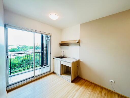 Modern kitchen with balcony view