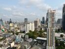 City skyline with various buildings and high-rises