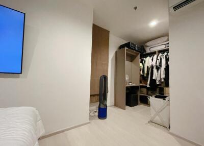 Bedroom with wardrobe and television