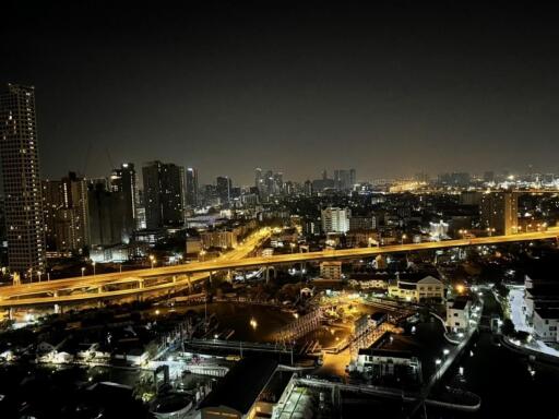 Night cityscape view from building balcony