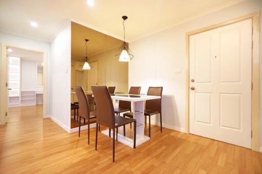 Modern dining area with table and chairs